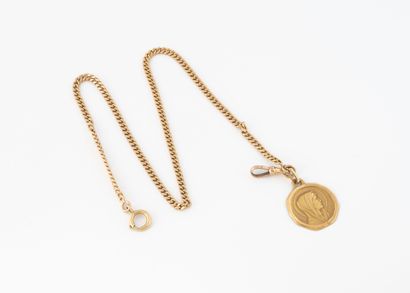 Yellow gold (750) watch chain adorned with...