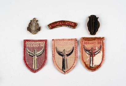 Two metal badges and fabric badges: Commando...