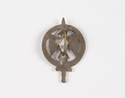 A badge: Commando No. 26. (Local manufac...