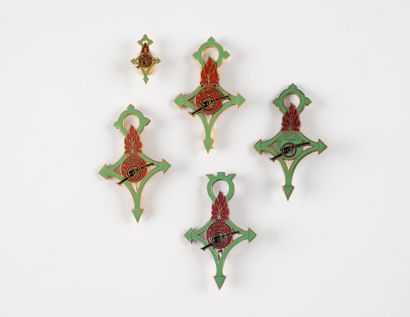 Four worn Saharan battery badges. Foreign...
