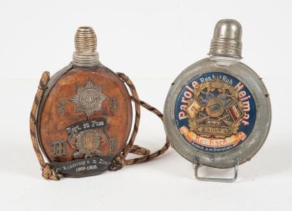 ALLEMAGNE
Two glass reservist flasks, one...