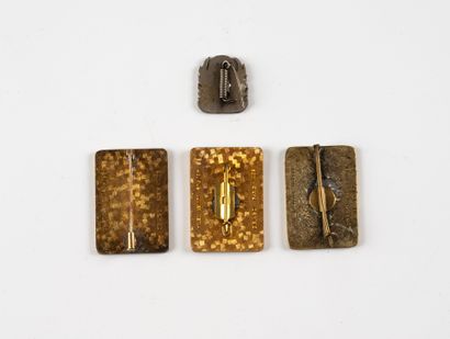 Four badges: 3 of the 10th B.P.C. (1 overmolded...