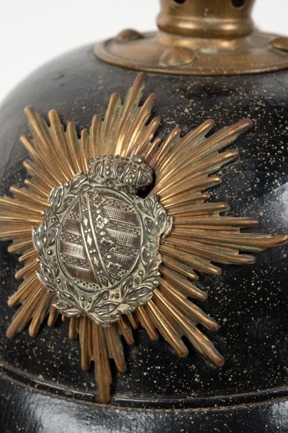 ALLEMAGNE
Saxon tip helmet, impacted. Patent...