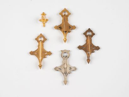 Four worn Saharan battery badges. Foreign...