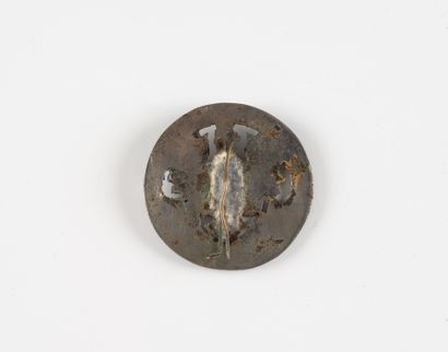 A badge: Commando n°22. (Local manufactu...
