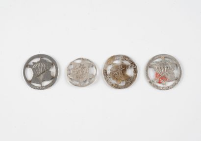 Four Shock Battalion headdress badges in...