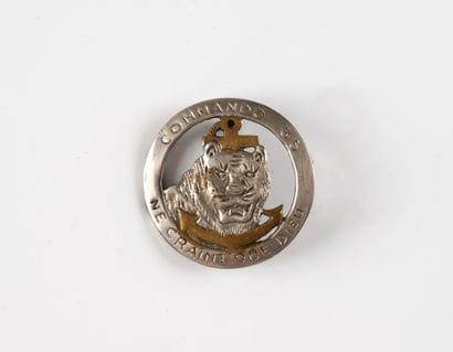 A badge: Commando No. 35. Made locally.