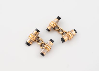 Paire de boutons de manchettes en or rose...