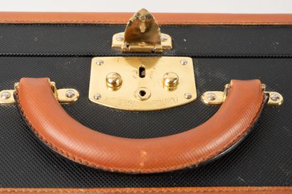 BOTTEGA VENETA
Valisette en toile enduite...