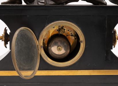 Gilt bronze and black marble clock surmounted...