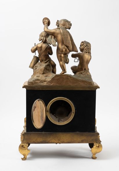 Gilt bronze and black marble clock surmounted...