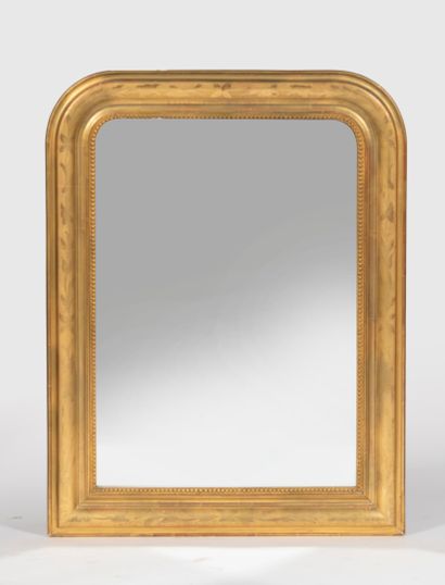 Two small gilded mantel mirrors, in molded...
