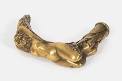 Pommeau de canne érotique.
En bronze à décor...