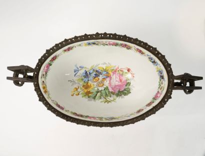 Large oval bowl on pedestalI. 
The body of...
