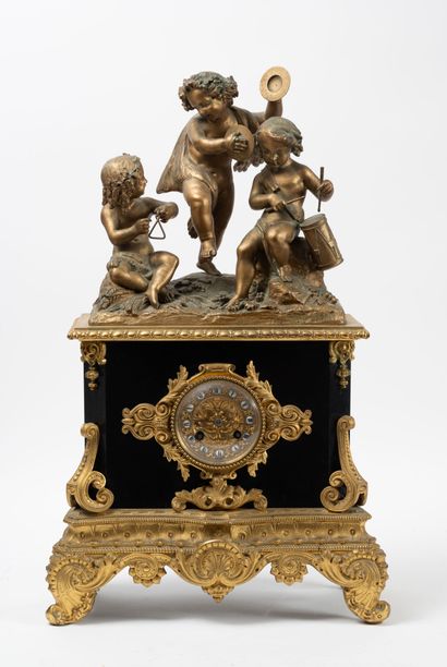 Gilt bronze and black marble clock surmounted...