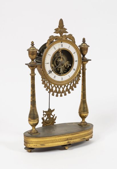 Small gilt bronze and brass portico clock...