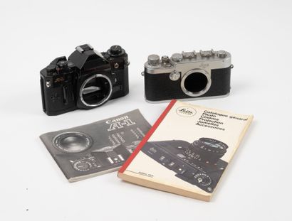 Two cameras, without lenses:
- Leitz Leica...