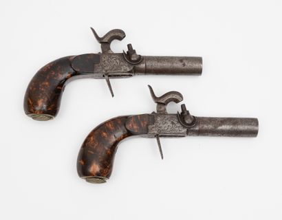 BELGIQUE, vers 1850
Pair of pocket pistols.
Forced-fire...
