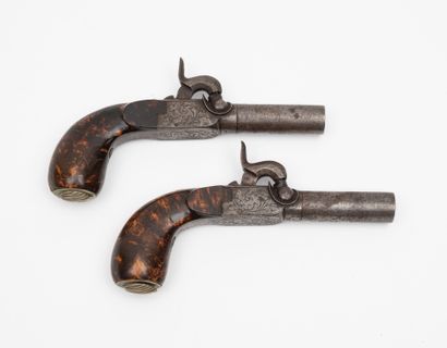 BELGIQUE, vers 1850
Pair of pocket pistols.
Forced-fire...