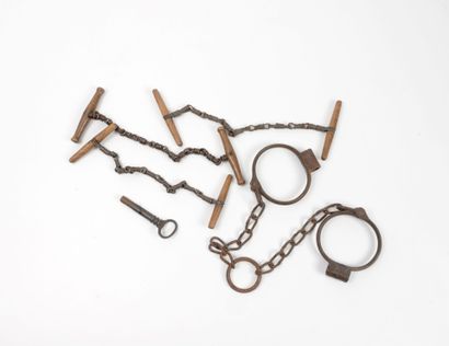 Three pairs of gendarmerie handcuffs in wood...