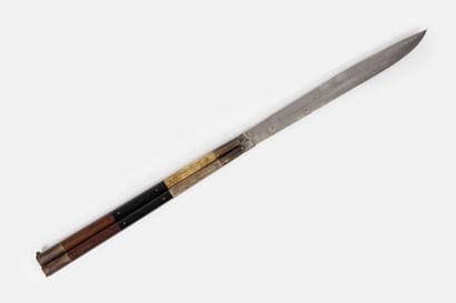 Large dagger.
With double folding handles,...