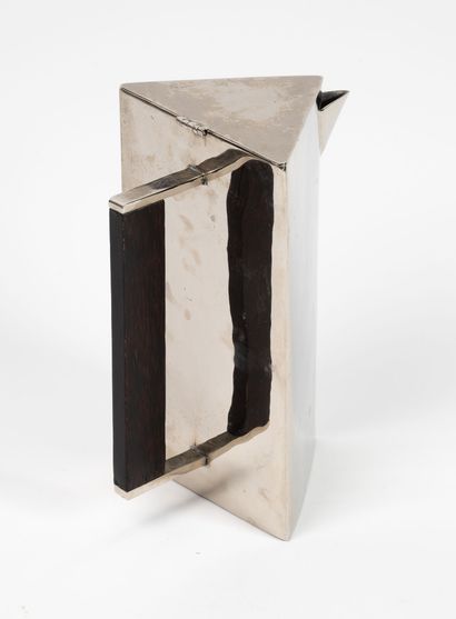 Porte-bouteilles.
En métal argenté et cuivre.
Système...