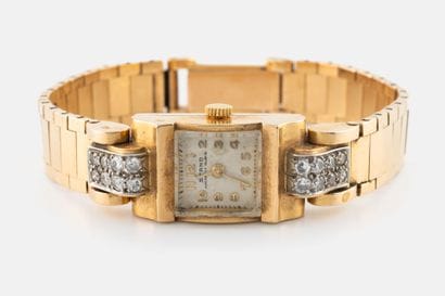 STAND
Ladies' watch in yellow gold (750)...