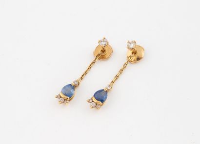 Pair of earrings in yellow gold (750), formed...