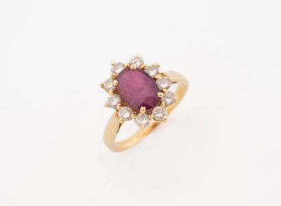 Bague marguerite en or jaune (750) centrée...