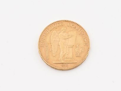 A 20 franc yellow gold coin depicting the...