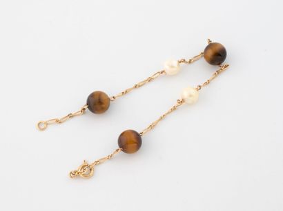 Bracelet en or jaune (750) à maille cheval,...