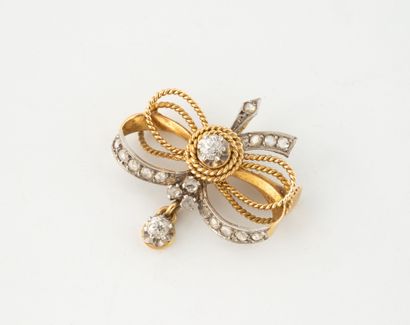 Broche pendentif en jaune (750) et platine...
