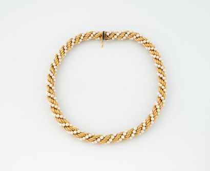 Yellow gold (750) choker necklace with twisted...