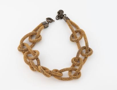 Yves Saint Laurent
Gold-plated rocaille pearl...