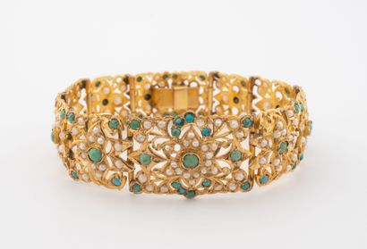INDE, XXème siècle
Bracelet articulé en or...