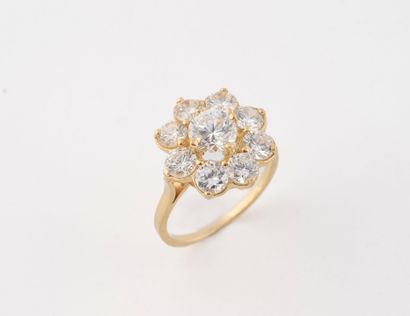 Yellow gold (750) daisy ring set with faceted...