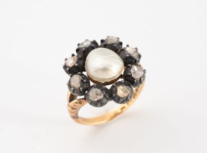 Bague en or jaune (750) et argent (min800)...