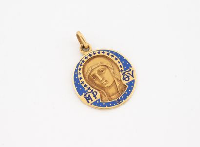 Médaille relieuse en or jaune (750) à figure...