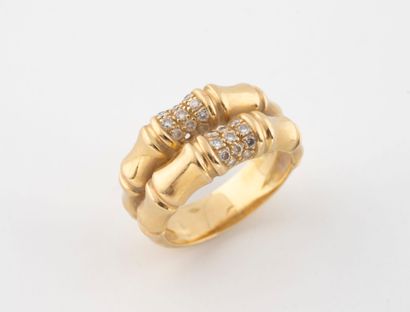 Yellow gold (750) ring with two fixed bamboo-shaped...