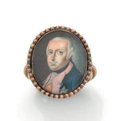 Yellow gold (385) political ring with oval...