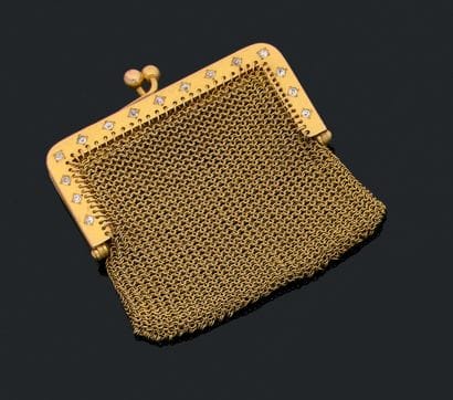 Jolie bourse en or jaune (750) en maille...