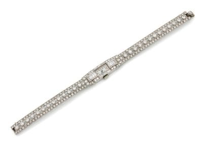 Élégante montre bracelet de dame.
Boîtier...