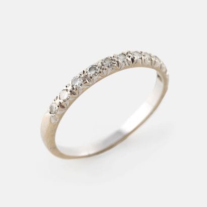 Half-American wedding band in white gold...