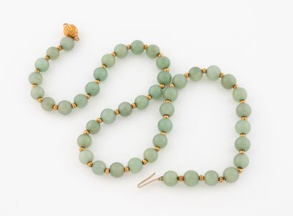 Necklace of jade beads alternating with yellow...