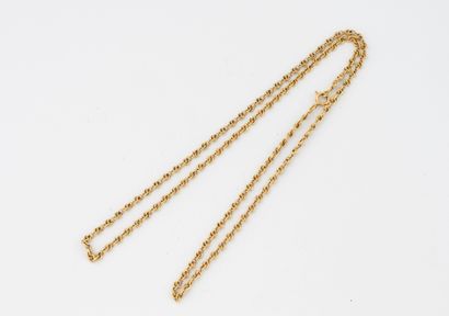 Yellow gold (750) neck chain with fancy knotwork....