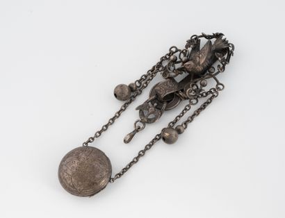 Silver-plated chatelaine centered on an openwork...
