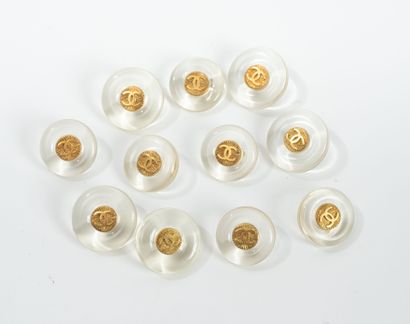 CHANEL 
Set of 11 transparent CHANEL buttons....