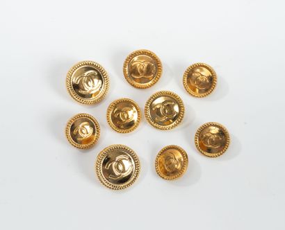 CHANEL 
Set of 9 gilded CHANEL buttons. 
Good...