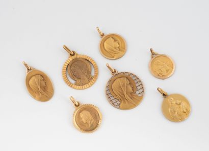 Set of seven medals in gilt metal, depicting...