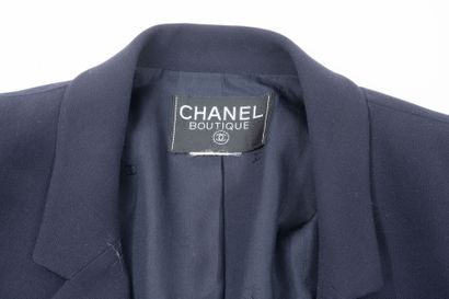 Chanel Boutique.
Navy blue button-down jacket...